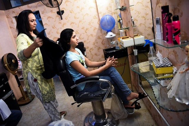 in this photo transgender beautician bebo haider l attends to a customer in her beauty parlour in karachi photo afp in this photo transgender beautician bebo haider l attends to a customer in her beauty parlour in karachi photo afp