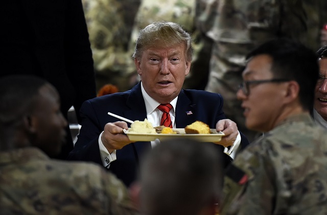 us president donald trump enjoys his thanksgiving dinner on his visit to us troops at bagram air field photo afp