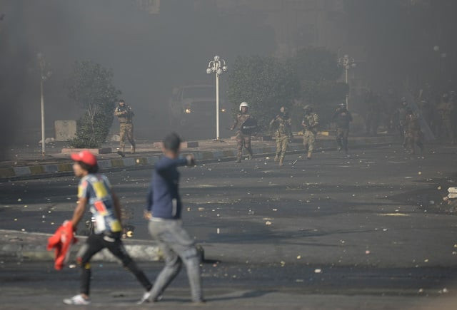 iraqi security forces are seen as they clash with demonstrators during ongoing anti government protests in nassiriya iraq november 28 2019 photo reuters iraqi security forces are seen as they clash with demonstrators during ongoing anti government protests in nassiriya iraq november 28 2019 photo reuters