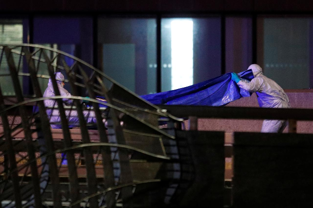 forensics officers work near the site of an incident at london bridge in london photo reuters