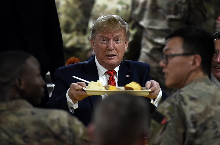 us president donald trump enjoying his thanksgiving dinner to visit us troops at bagram air field photo afp