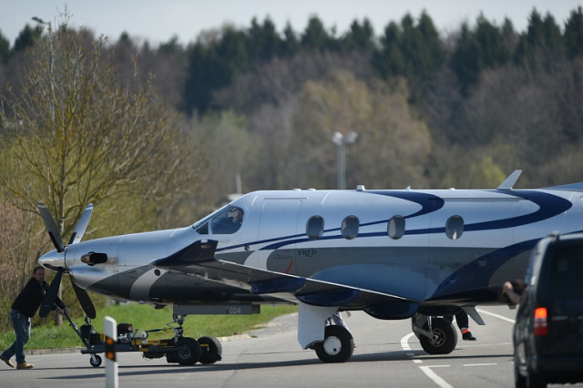 a file picture shows a pilatus pc 12 single engined aircraft similar to the one involved in the crash in which nine people were killed photo afp a file picture shows a pilatus pc 12 single engined aircraft similar to the one involved in the crash in which nine people were killed photo afp