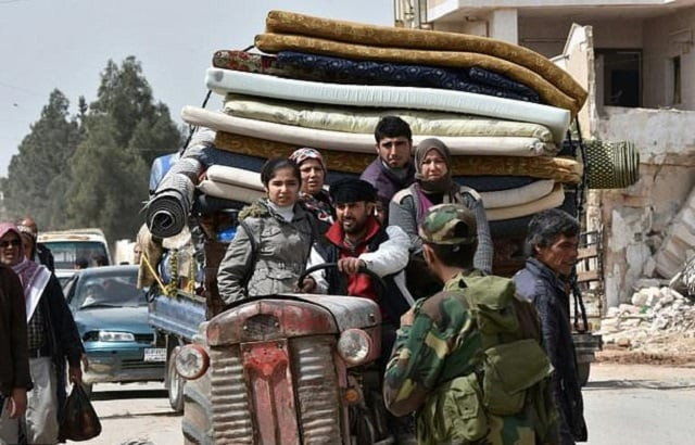 syrians displaced from the city of afrin arrive with their belongings in the northern syrian town of tal rifaat photo afp file syrians displaced from the city of afrin arrive with their belongings in the northern syrian town of tal rifaat photo afp file