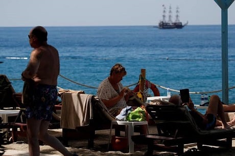 tourists enjoy a sunny day in fethiye turkey photo reuters