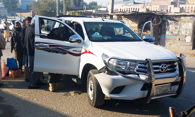 afghan security force personnel inspect an area around a vehicle following an attack in jalalabad on wednesday photo afp afghan security force personnel inspect an area around a vehicle following an attack in jalalabad on wednesday photo afp