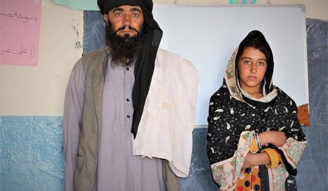 a photo captured by the international non governmental organisation of mia khan with one of his daughters photo courtesy swedish committee for afghanistan