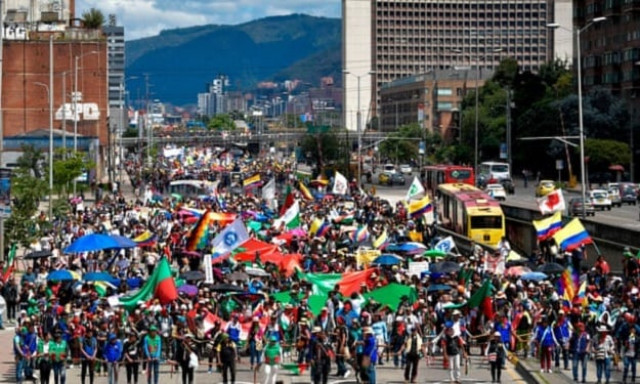 indigenous people and students take part in a protest against the government of the colombian president iv n duque in bogot on 4 december 2019 photo afp
