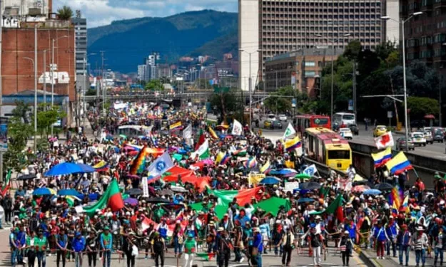indigenous people and students take part in a protest against the government of the colombian president iv n duque in bogot on 4 december 2019 photo afp indigenous people and students take part in a protest against the government of the colombian president iv n duque in bogot on 4 december 2019 photo afp