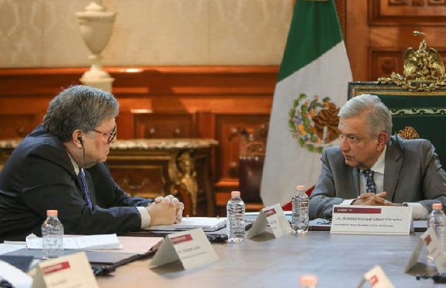 president andres manuel lopez obrador r and us attorney general bill barr during a meeting at the palacio nacional in mexico city photo afp