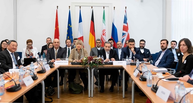 iranian political deputy at the ministry of foreign affairs of iran abbas araghchi center right and german secretary general of the european external action service eeas helga maria schmid center left attend a meeting of the joint commission on iran 039 s nuclear program jcpoa at eu delegation to the international organizations office in vienna austria on friday photo afp