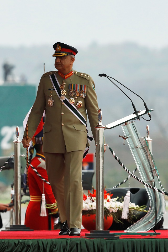 pakistan 039 s army chief of staff general qamar javed bajwa walks as he arrives to attend the pakistan day military parade in islamabad pakistan on march 23 2019 photo reuters file