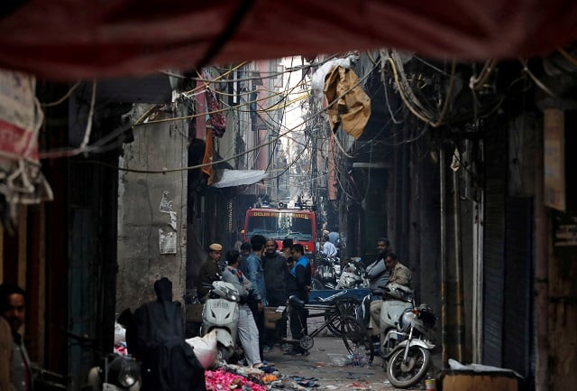 a fire engine is seen at the site of a fire that swept through a factory where laborers were sleeping in new delhi india december 8 2019 photo reuters a fire engine is seen at the site of a fire that swept through a factory where laborers were sleeping in new delhi india december 8 2019 photo reuters