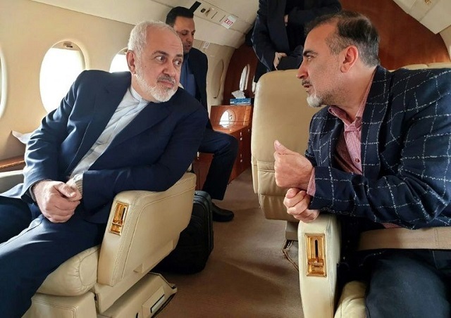 foreign minister mohammad javad zarif left and iranian scientist massoud soleimani in a plane following a prisoner exchange with the us photo afp file