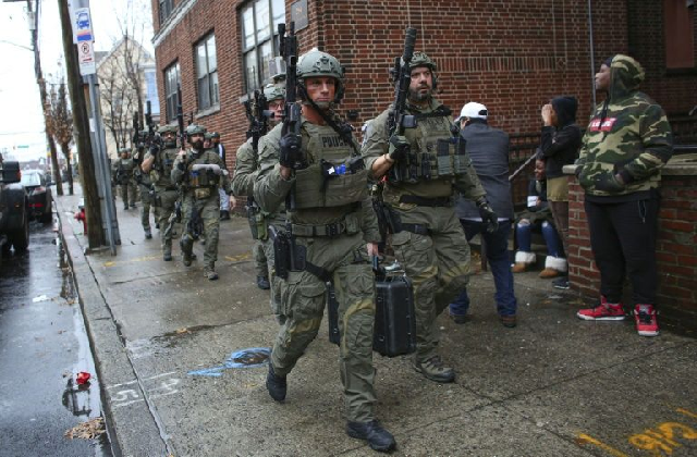 hundreds of police from new jersey and new york including tactical officers were deployed during the hours long shooting in jersey city new jersey photo afp