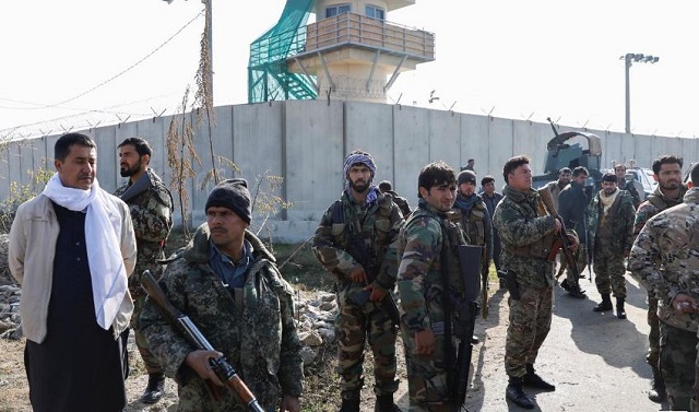 afghan security forces arrive near the site of a suicide attack in bagram north of kabul afghanistan december 11 2019 photo reuters