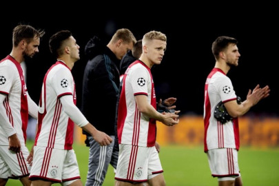 ajax crash out of the champions league after defeat by valencia