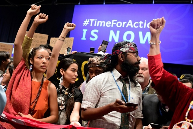 negotiators in madrid are hashing out the rulebook for the landmark paris accord which aims to keep global temperature rises quot well below quot two degrees celsius 3 6 fahrenheit photo afp