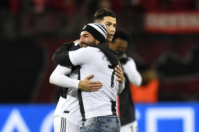 an angry juventus star pushed the fan away before security staff intervened photo afp an angry juventus star pushed the fan away before security staff intervened photo afp