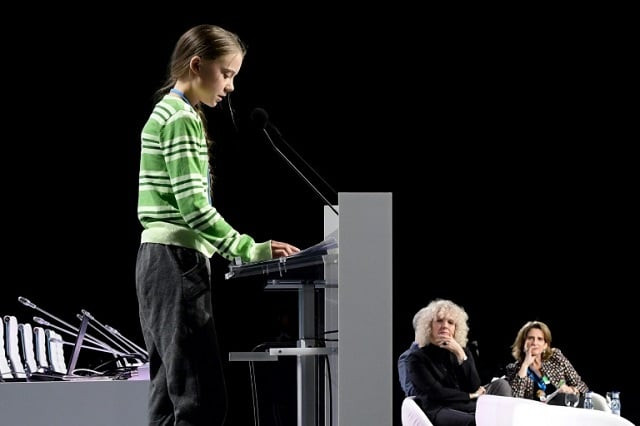 swedish climate activist greta thunberg gives a speech during the cop25 un climate change conference in madrid with greenpeace international executive director jennifer morgan and spanish environment minister teresa ribera in the background photo afp swedish climate activist greta thunberg gives a speech during the cop25 un climate change conference in madrid with greenpeace international executive director jennifer morgan and spanish environment minister teresa ribera in the background photo afp