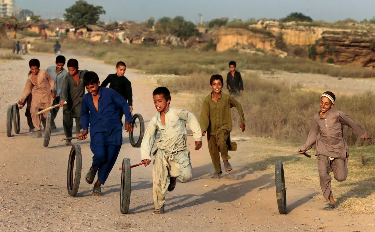 children play with tyres in islamabad pakistan photo reuters children play with tyres in islamabad pakistan photo reuters