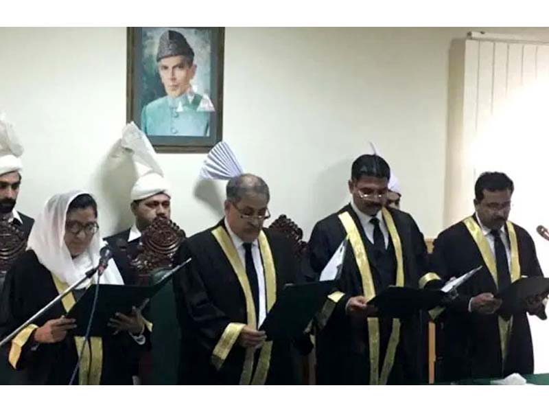 ihc chief justice athar minallah administers oath to three new judges including lubna saleem pervaiz photo courtesy radio pakistan