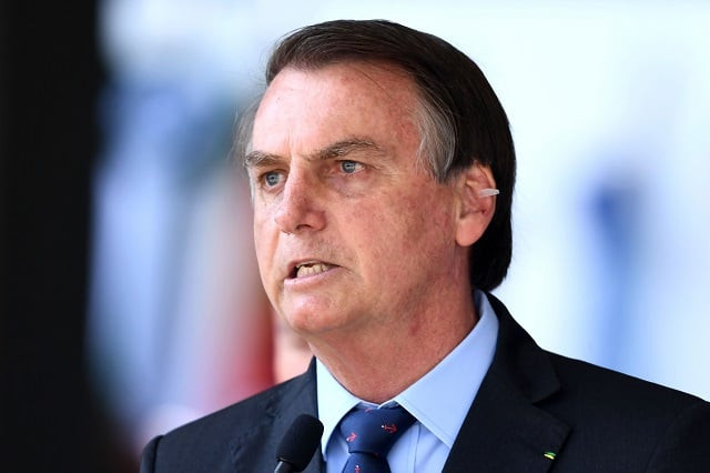 brazilian president jair bolsonaro attends the navy day celebrations at the marines corp headquarters in brasilia photo afp