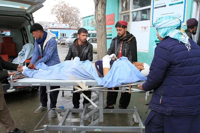 a wounded man is brought to a hospital after a vehicle was hit by a roadside bomb in ghazni photo afp a wounded man is brought to a hospital after a vehicle was hit by a roadside bomb in ghazni photo afp