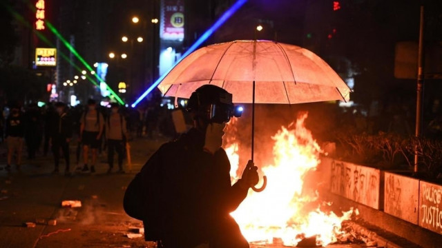 footage of the incident showed rival groups of protesters throwing bricks at each other during which a man was hit by a brick and fell to the ground photo afp footage of the incident showed rival groups of protesters throwing bricks at each other during which a man was hit by a brick and fell to the ground photo afp