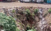 banks may burst torrential rains and high floods cause severe soil erosion along the banks of nullah leh in rawalpindi photo express