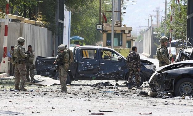 foreign troops with nato led resolute support mission investigate at the site of a suicide attack in kabul afghanistan september 5 2019 photo reuters