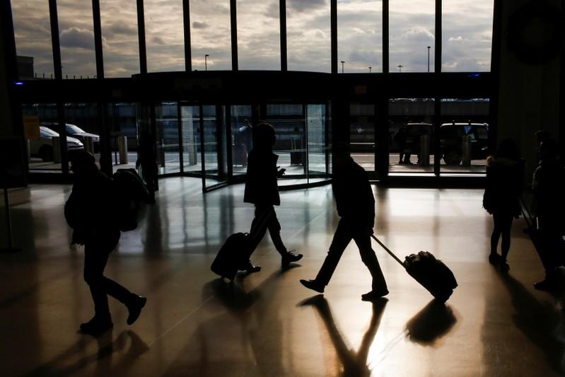 a reuters file photo of passengers at an airport