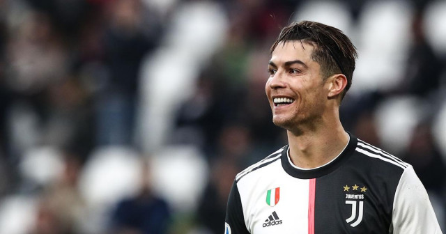 portuguese star struck twice to make it five goals in four games as the champions move one point ahead of inter milan photo afp portuguese star struck twice to make it five goals in four games as the champions move one point ahead of inter milan photo afp
