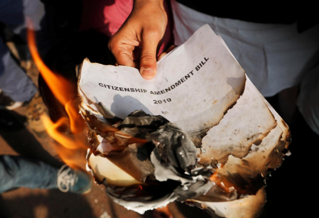 demonstrators burn copies of citizenship amendment bill a bill that seeks to give citizenship to religious minorities persecuted in neighbouring muslim countries during a protest in new delhi india december 11 2019 photo reuters demonstrators burn copies of citizenship amendment bill a bill that seeks to give citizenship to religious minorities persecuted in neighbouring muslim countries during a protest in new delhi india december 11 2019 photo reuters