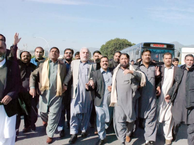 punjab local government members including mayors and councilors protest outside parliament house in favour of their demands photo zafar aslam raja express