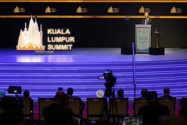 malaysia s prime minister mahathir mohamad delivers his keynote address during kuala lumpur summit in kuala lumpur malaysia photo reuters