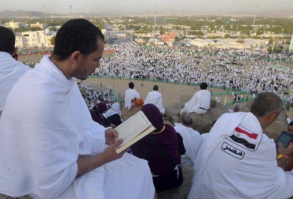 muslim pilgrims pray at mount arafat also known as jabal al rahma mount of mercy southeast of the saudi holy city of mecca as the climax of the hajj pilgrimage approaches on august 10 2019 photo afp