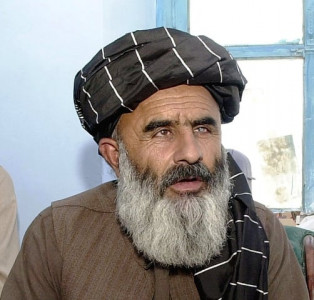 firefight in kabul top karzai aide lawmaker slain in attack