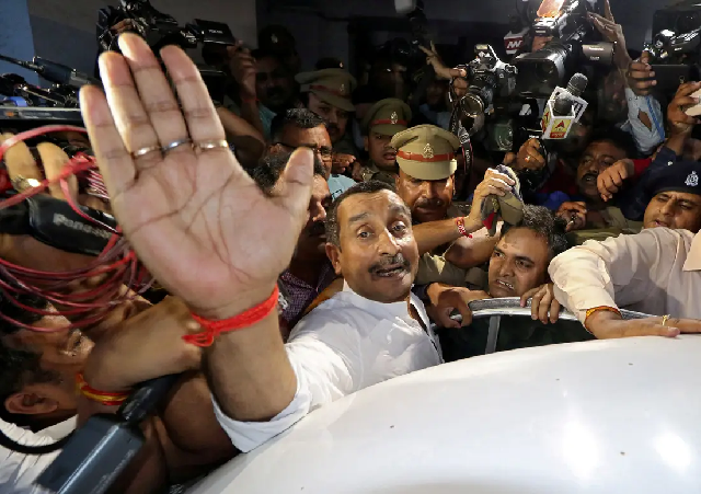 kuldeep singh sengar a legislator of uttar pradesh state from india 039 s ruling bharatiya janata party bjp reacts as he leaves a court after he was arrested photo reuters