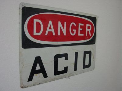 assault neighbours throw acid on each other