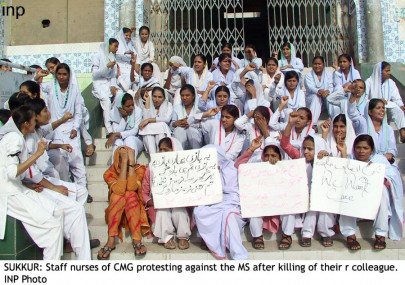 sit in angry nurses protest against the death of colleague