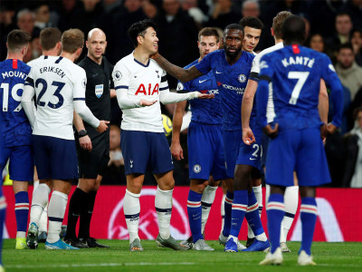 football racism inquiry call after spurs chelsea clash halted