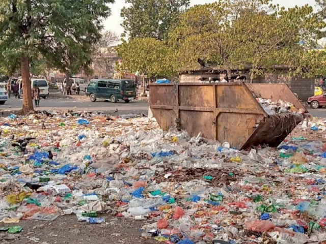 a roadside is littered as sanitary workers observe strike in islamabad photo express a roadside is littered as sanitary workers observe strike in islamabad photo express