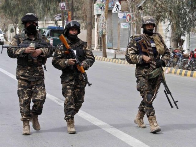 afghan national intelligence officers patrol a street photo reuters file