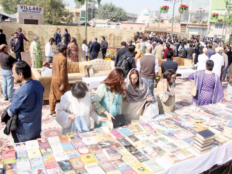 crowds pore over books at the street library located at the commissioner s corner near metropole photo online