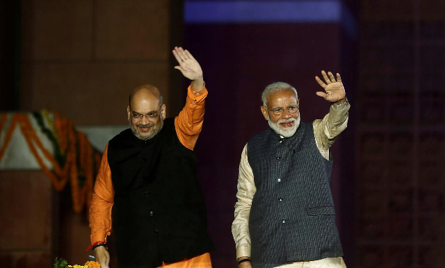 prime minister narendra modi and bharatiya janata party bjp president amit shah wave towards their supporters photo reuters prime minister narendra modi and bharatiya janata party bjp president amit shah wave towards their supporters photo reuters