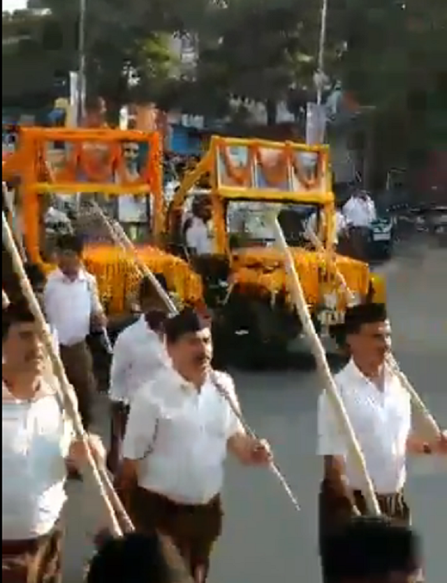 several thousand baton wielding volunteers from a hindu hardline group held rally in support of govt