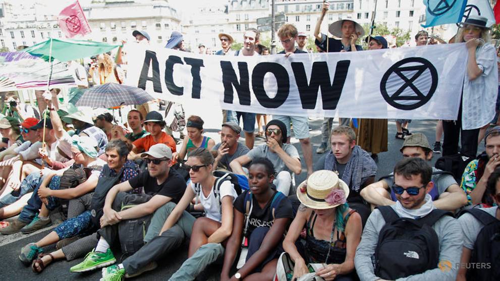 protesters gather as paris declares climate emergency photo reuters