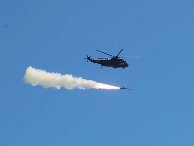 pakistan navy helicopter is witnessed demonstrating fire power in north arabian sea photo pakistan navy pakistan navy helicopter is witnessed demonstrating fire power in north arabian sea photo pakistan navy