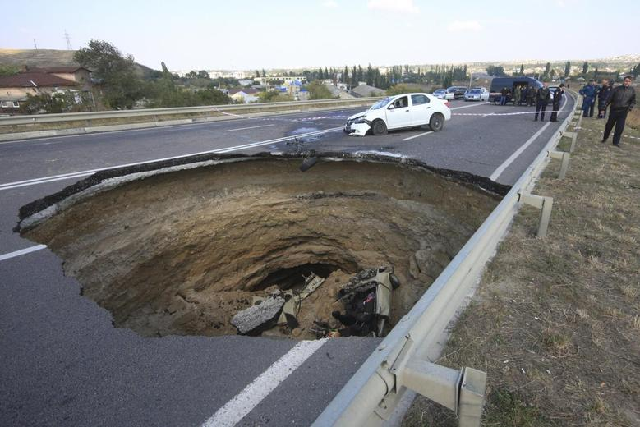 Repeated sinkholes on the road are once again hindering traffic