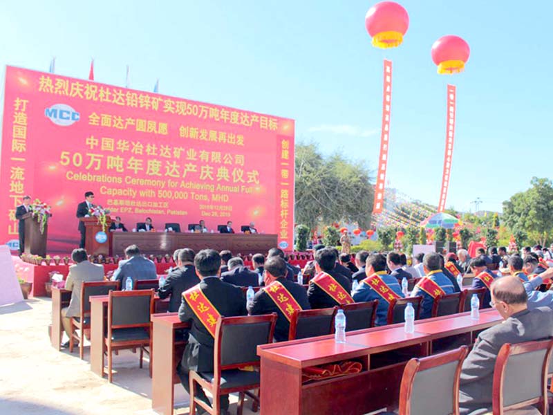 chinese official addresses a ceremony organised to celebrate achievement of peak production photo express